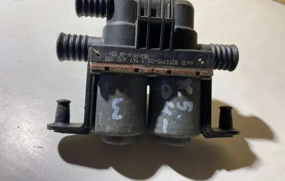 Coolant heater control valve