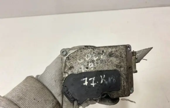 Volkswagen Golf V Throttle valve 03G128063C