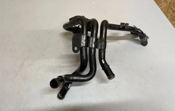 Volkswagen Golf VII Engine coolant pipe/hose 04L121064AC