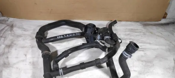 Volkswagen Golf VII Engine coolant pipe/hose 5Q0121599AN