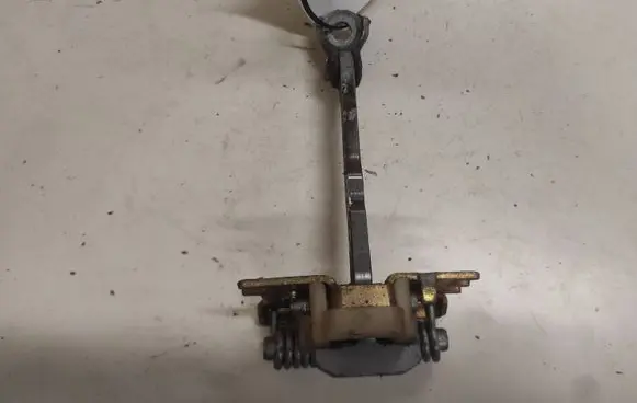 Front door check strap stopper