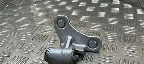 Front door lower hinge