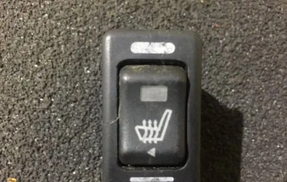 Nissan Almera N16 Seat heating switch