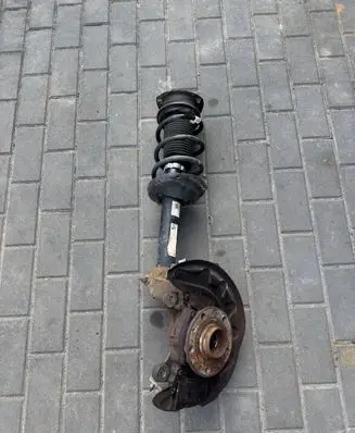 Volkswagen Golf Sportsvan Front shock absorber with coil spring 5Q0413023FL