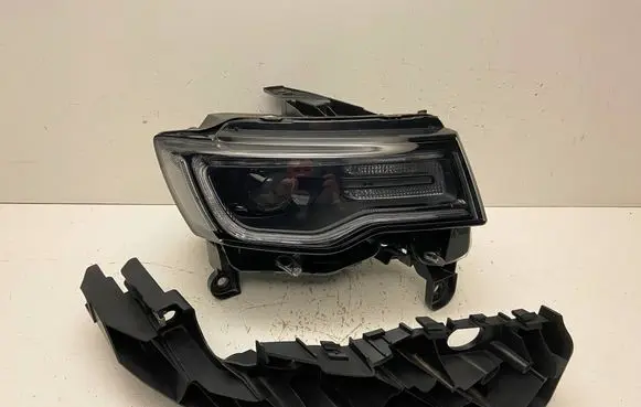 Jeep Grand Cherokee Headlight/headlamp 68266656AH 337263 T77613B