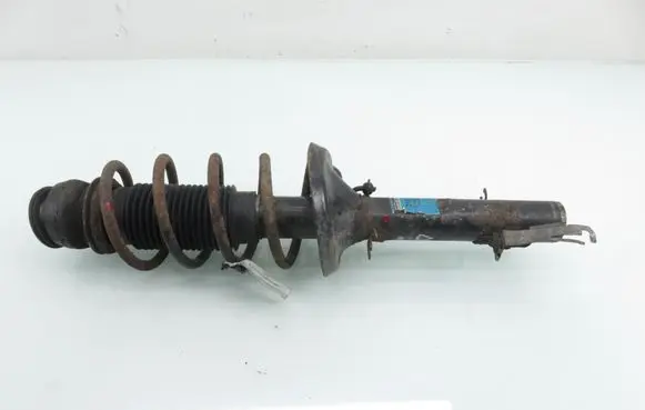 Volkswagen Golf IV Front shock absorber with coil spring 