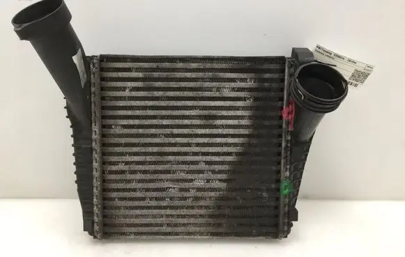 Volkswagen Touareg I Intercooler radiator 