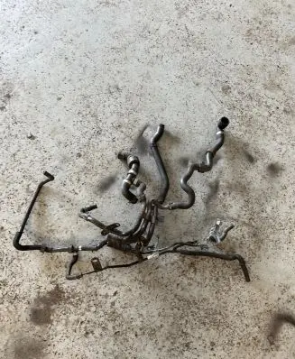 Skoda Octavia Mk3 (5E) Engine coolant pipe/hose 04L121064AD