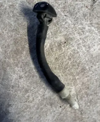 Mitsubishi Pajero Windshield washer spray nozzle 
