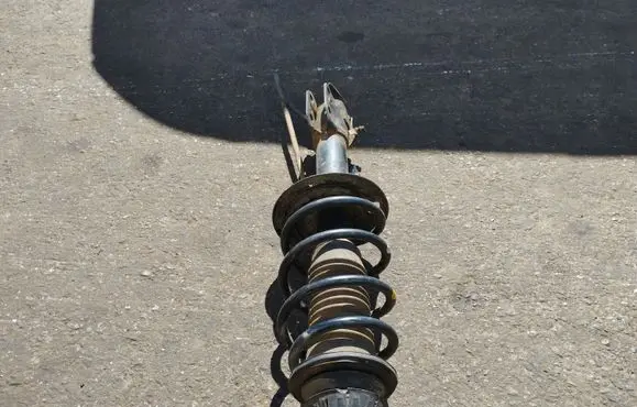 Front shock absorber with coil spring