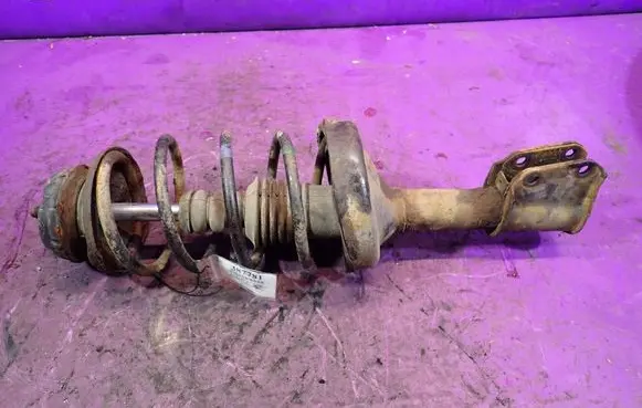 Renault Thalia I Front shock absorber with coil spring 