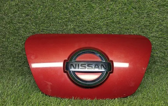 Nissan Leaf I (ZE0) Electric car charge socket cover 657133NK0A