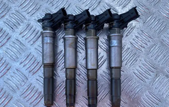 Renault Laguna III Fuel injectors set 0445115007 H82409398