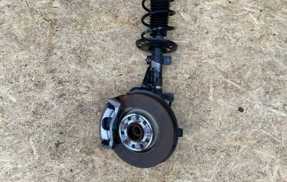 Front wheel hub spindle knuckle