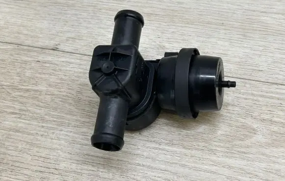 Volkswagen Touareg II Coolant heater control valve 1J0819809