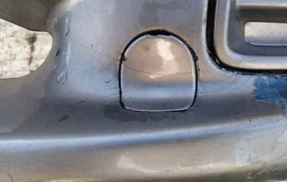 Nissan Almera N16 Front tow hook cap/cover
