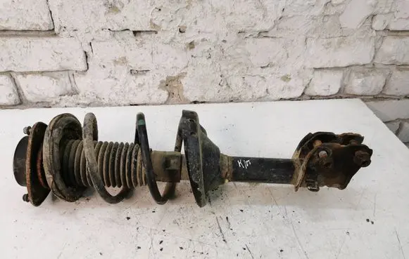 Subaru Outback Front shock absorber with coil spring 20310AJ090 FL14