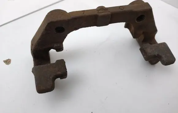 Saab 9-3 Ver2 Brake caliper pad carrier rear 93172188