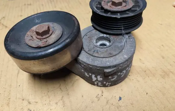 Jeep Grand Cherokee (WJ) Generator/alternator belt tensioner 53030958