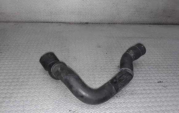 Volkswagen PASSAT B5 Engine coolant pipe/hose 8D0121101
