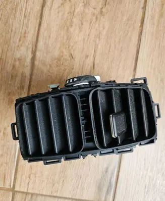 Dash center air vent grill