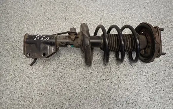 Mazda 323 Front shock absorber with coil spring