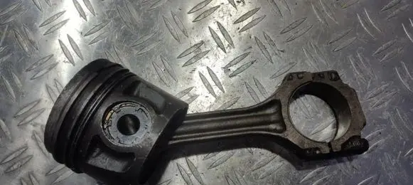 Piston with connecting rod