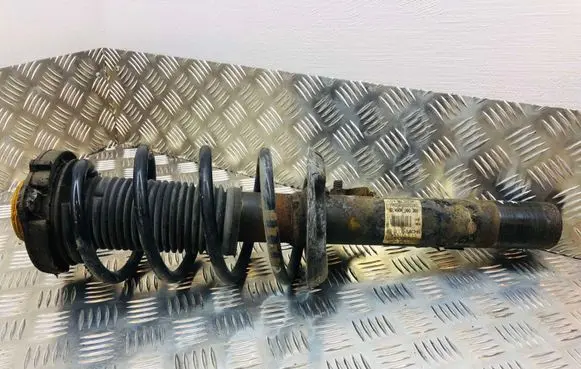 Volkswagen Touran I Front shock absorber with coil spring