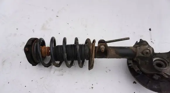 Volkswagen PASSAT B7 Front wheel hub spindle knuckle MCPERSON