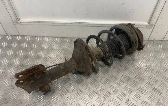 Subaru Forester SG Front shock absorber with coil spring