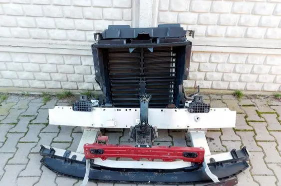 Radiator support slam panel
