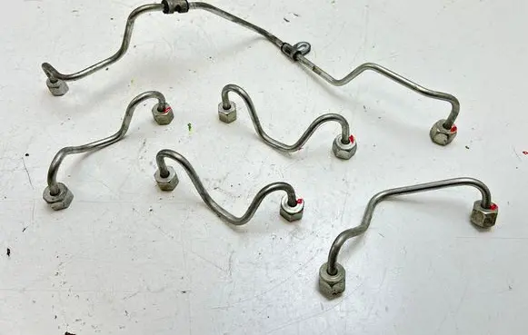 Renault Laguna III Fuel injector supply line/pipe 734023A