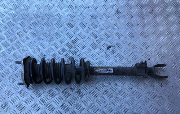 Front shock absorber with coil spring