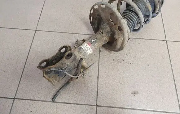 Toyota Avensis T270 Front shock absorber with coil spring 4852005331