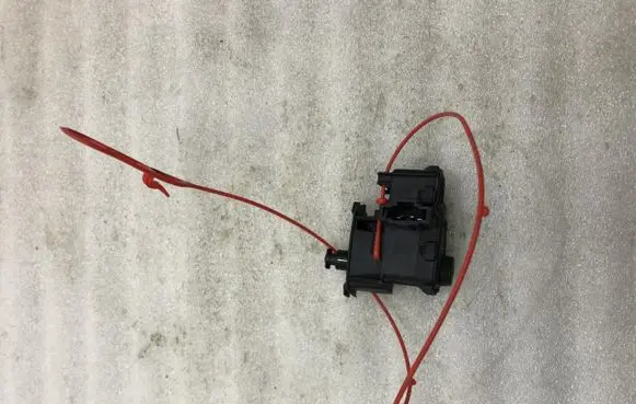 Fuel tank cap lock motor