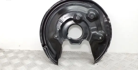Volkswagen PASSAT B7 Rear brake disc plate dust cover 5N0615612C