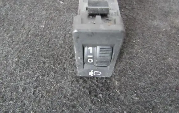 Headlight level height control switch