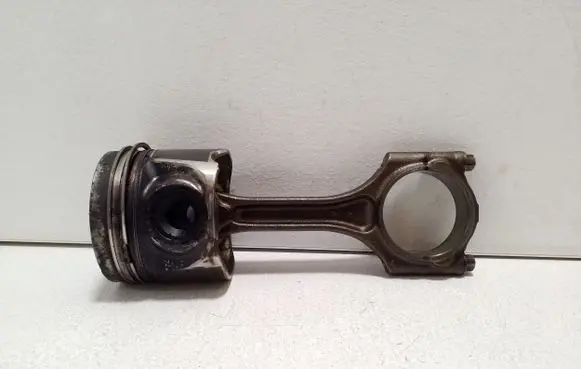 Piston with connecting rod