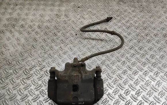 Nissan Juke I F15 Front brake caliper 