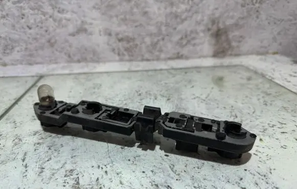 Volvo S80 Tail light bulb cover holder 153852
