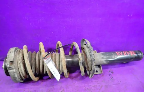 Volkswagen Polo Front shock absorber with coil spring