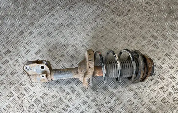 Subaru Forester SG Front shock absorber with coil spring