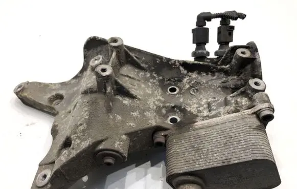 Volkswagen PASSAT B7 Oil filter mounting bracket 06J903143AH