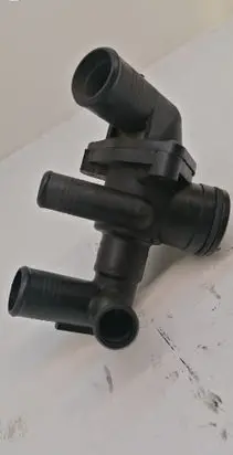 Thermostat/thermostat housing
