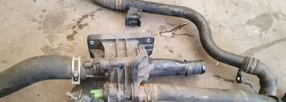 Thermostat/thermostat housing