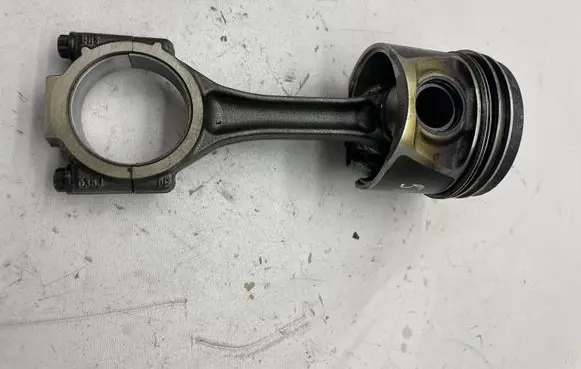 Volkswagen Touran I Piston with connecting rod STUMUOKLIS
