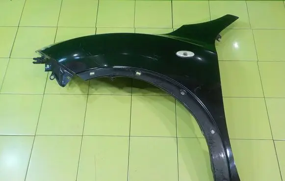 Nissan Juke I F15 Fender PRZOD LEWY