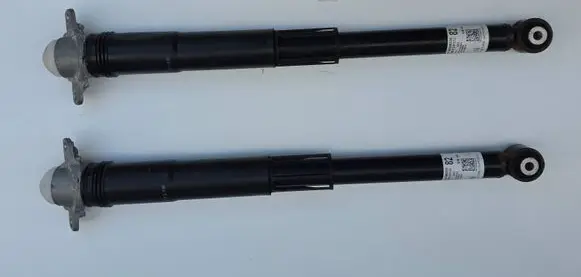 Volkswagen Golf VII Rear shock absorber with coil spring 5Q0512013EL