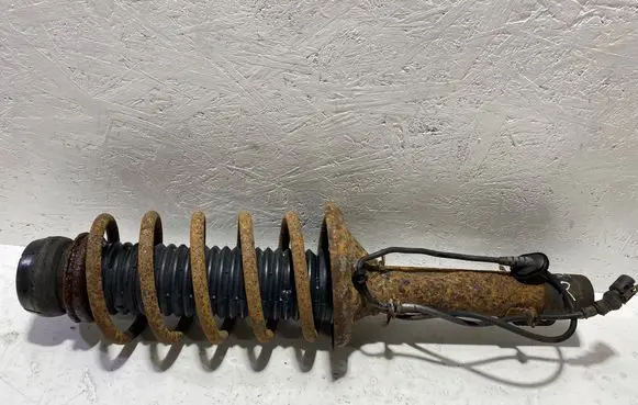 Volkswagen Golf IV Front shock absorber with coil spring 