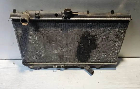 Mazda 323 F Coolant radiator 4886457